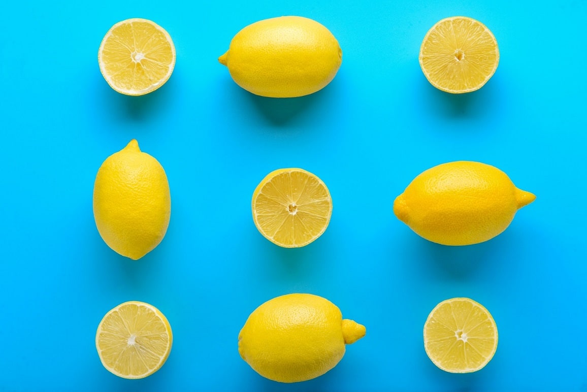 Ripe,Lemons,On,Color,Background