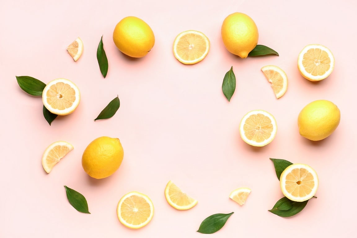 Frame,Made,Of,Fresh,Lemons,On,Pink,Background